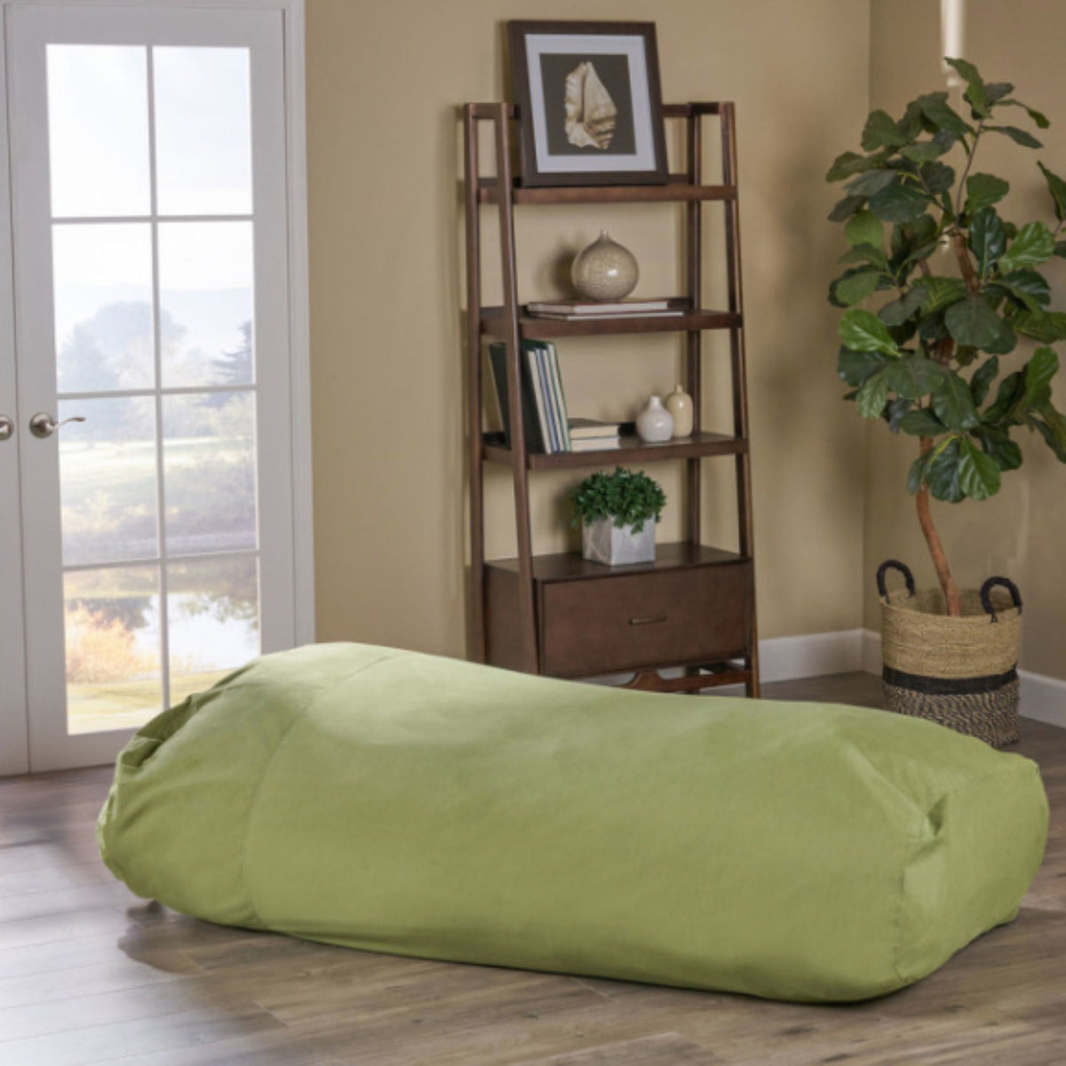 Water Resistant Lounger Bean Bag with Foam Filling in green in living room beside bookshelf on Tampa Home & Garden Store