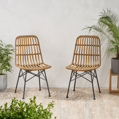 Sawtelle Outdoor Dining Chairs pair by HouseOfZazla in natural wicker with black legs, greenery on Tampa Home & Garden Store