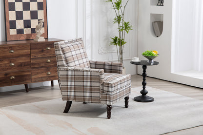 Upholstered Accent Chair in brown plaid linen with nailhead trim and dark wooden legs on Tampa Home & Garden Store