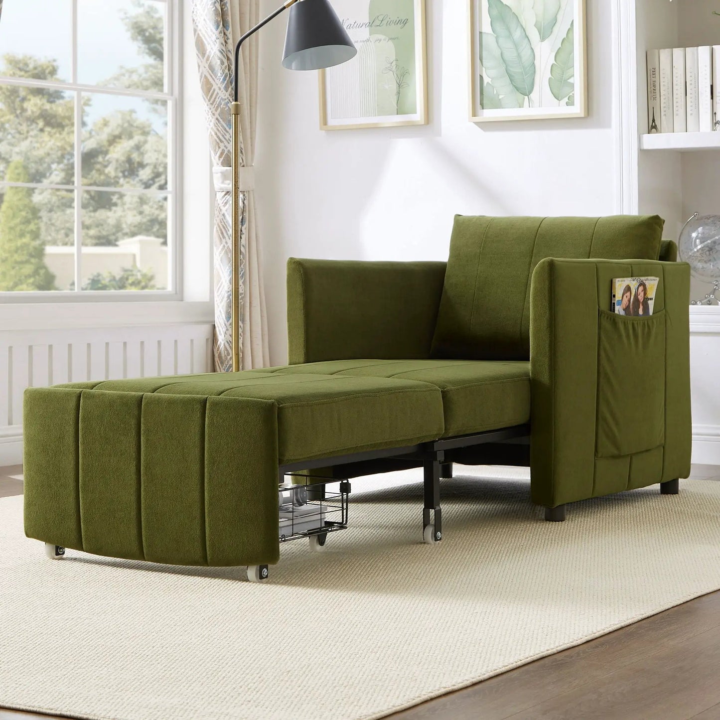 Upholstered green sleeper futon sofa with side pockets and storage, rolling metal base in room on Tampa Home & Garden Store