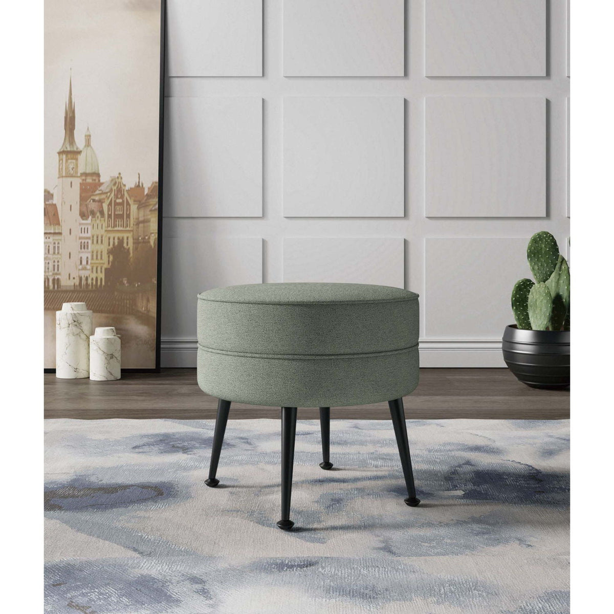 Bailey Accent Ottoman, green textured fabric, round cushioned seat with black tapered legs on Tampa Home & Garden Store