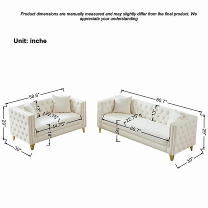 Two deep-seat beige tufted sofas with button nailhead trim and square arms on Tampa Home & Garden Store