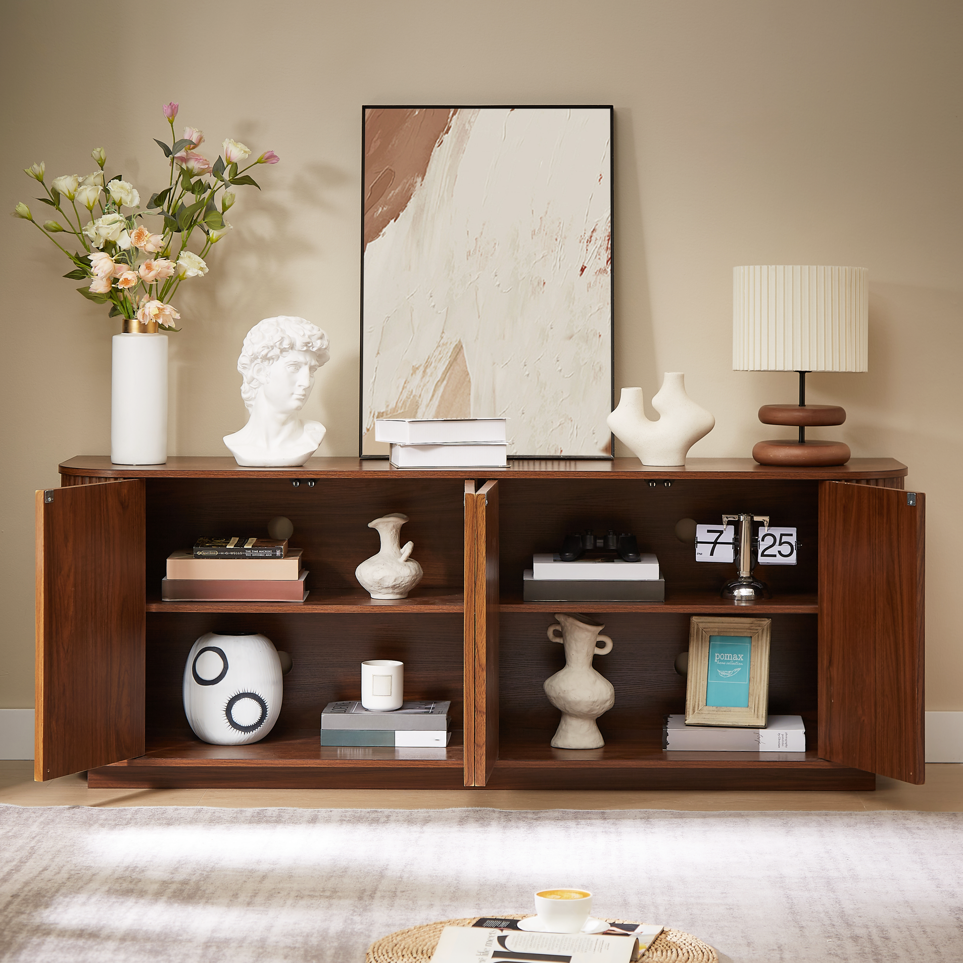 Sideboard storage cabinet in dark wood with open shelves and wave-pattern art on Tampa Home & Garden Store