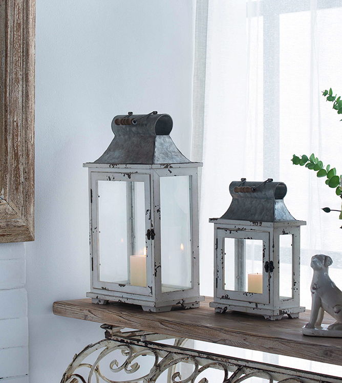 Wooden candle lanterns set of two, distressed white finish with glass panels and metal tops on Tampa Home & Garden Store