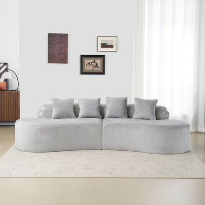 Modern Curved Sofa and the Soft Linen Pillows