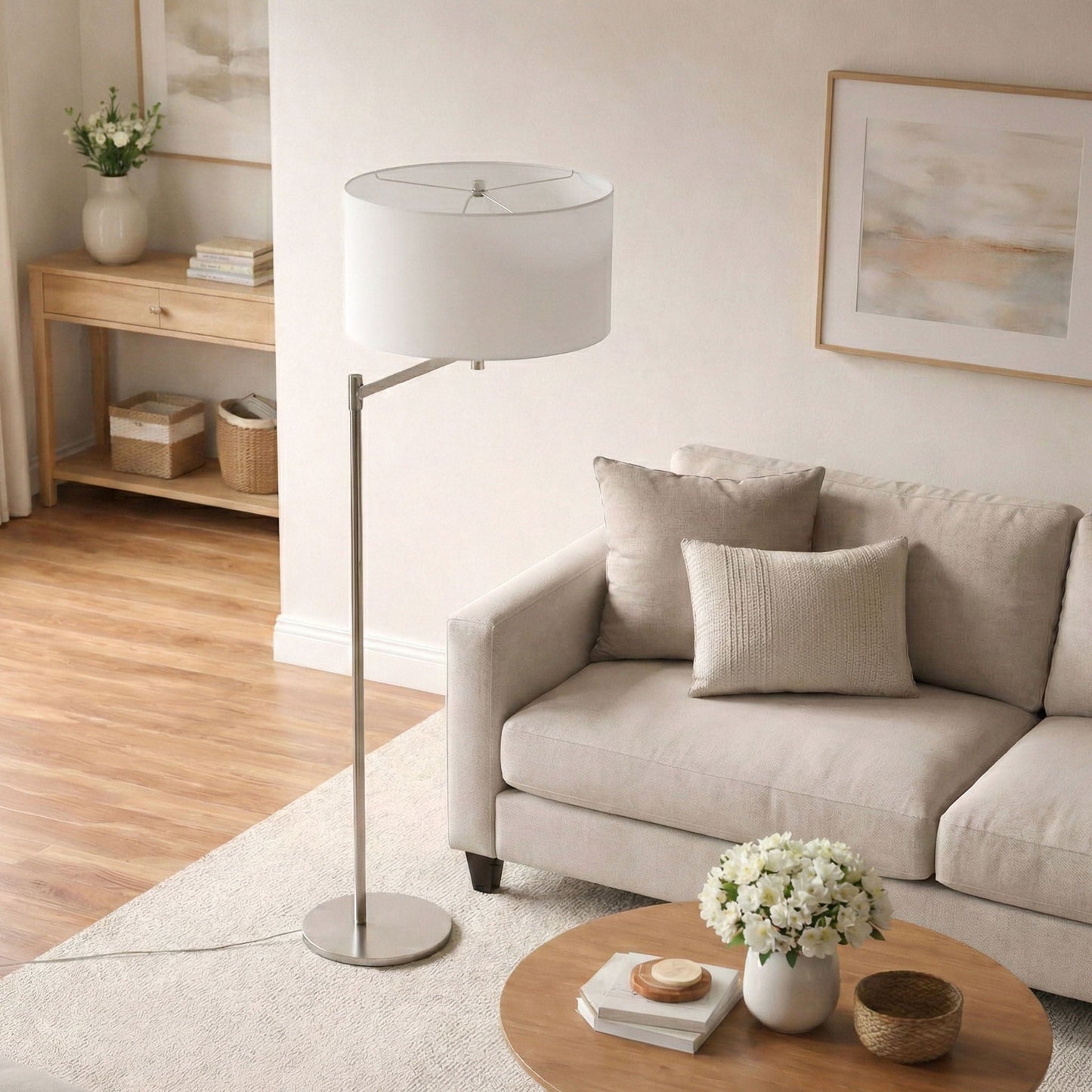 Horizon table lamp with curved nickel base and white linen shade, on/off switch in living room on Tampa Home & Garden Store