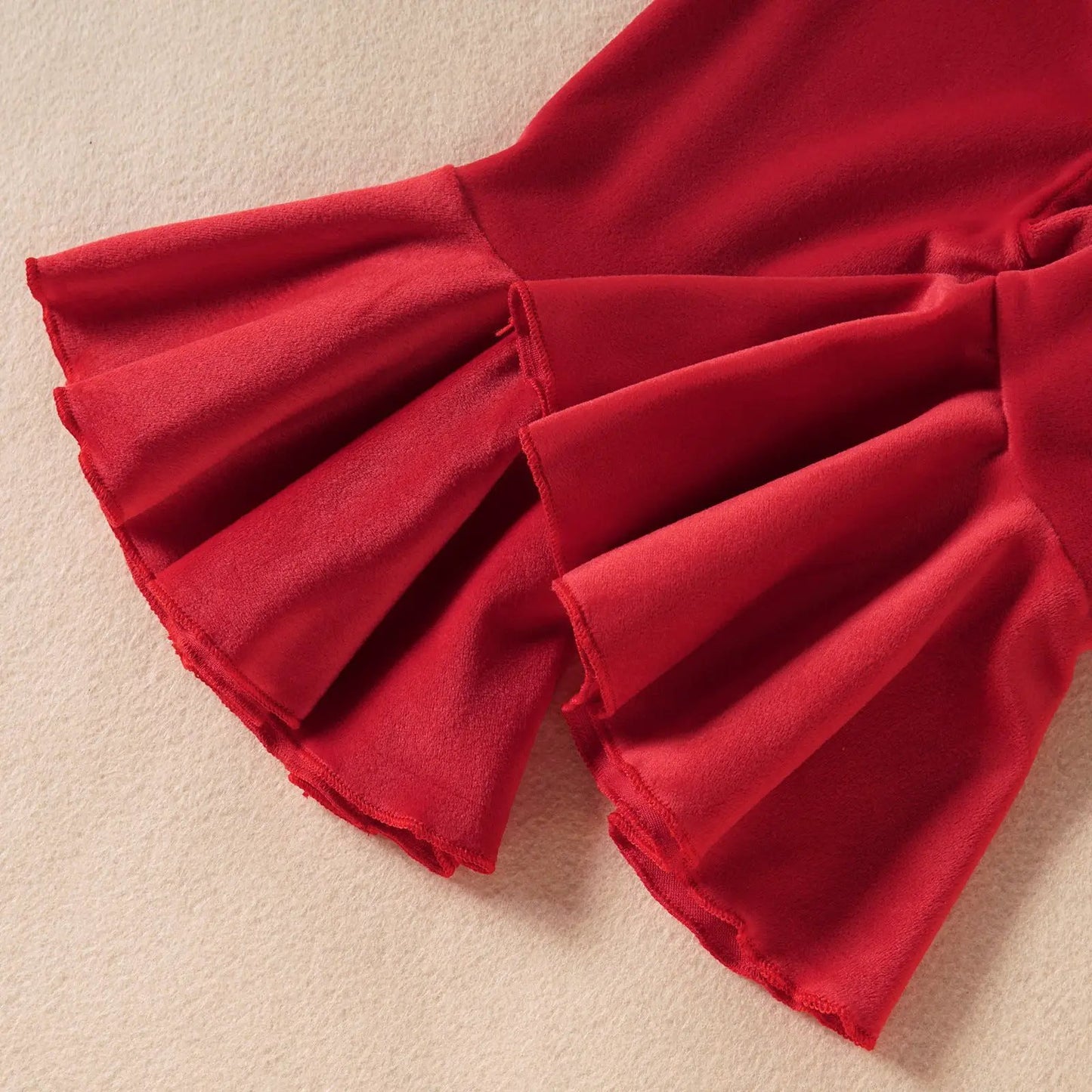 Infant red velvet flared pants with layered ruffle hems on Tampa Home & Garden Store
