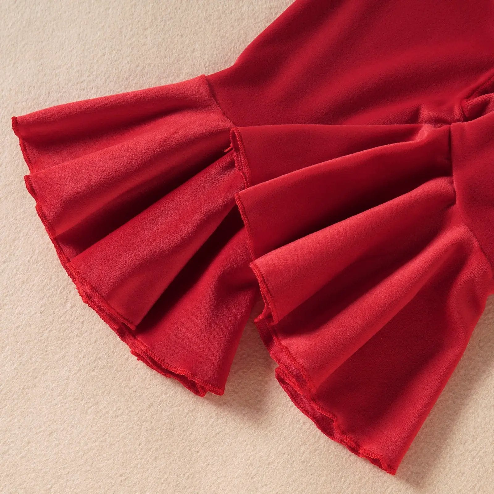 Infant red velvet flared pants with layered ruffle hems on Tampa Home & Garden Store