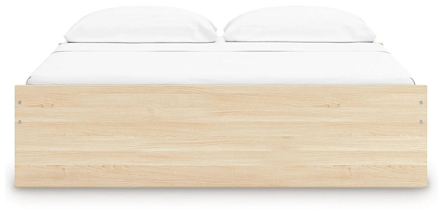Onita Platform Bed, light oak storage bed by Unique Piece Furniture with white bedding on Tampa Home & Garden Store