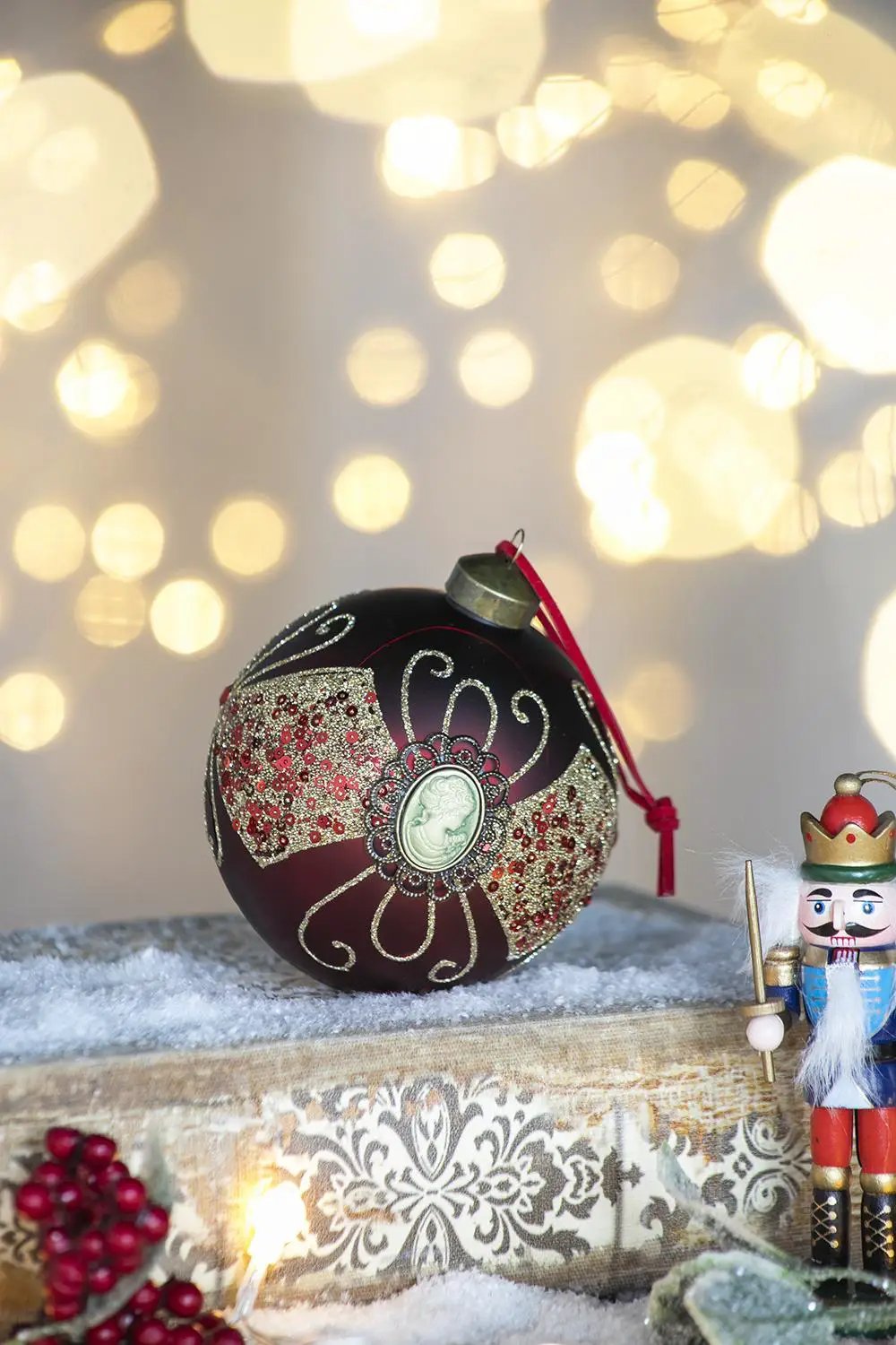 Maroon hanging ball ornament set of 6 with glittering silver pattern and cameo centerpiece on Tampa Home & Garden Store