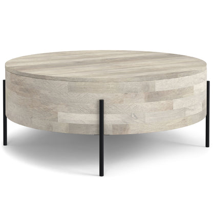 Round solid mango wood coffee table with black metal legs, light natural finish on Tampa Home & Garden Store