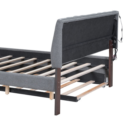 Upholstered platform bed with trundle in grey fabric, black headboard panel, wooden slats on Tampa Home & Garden Store