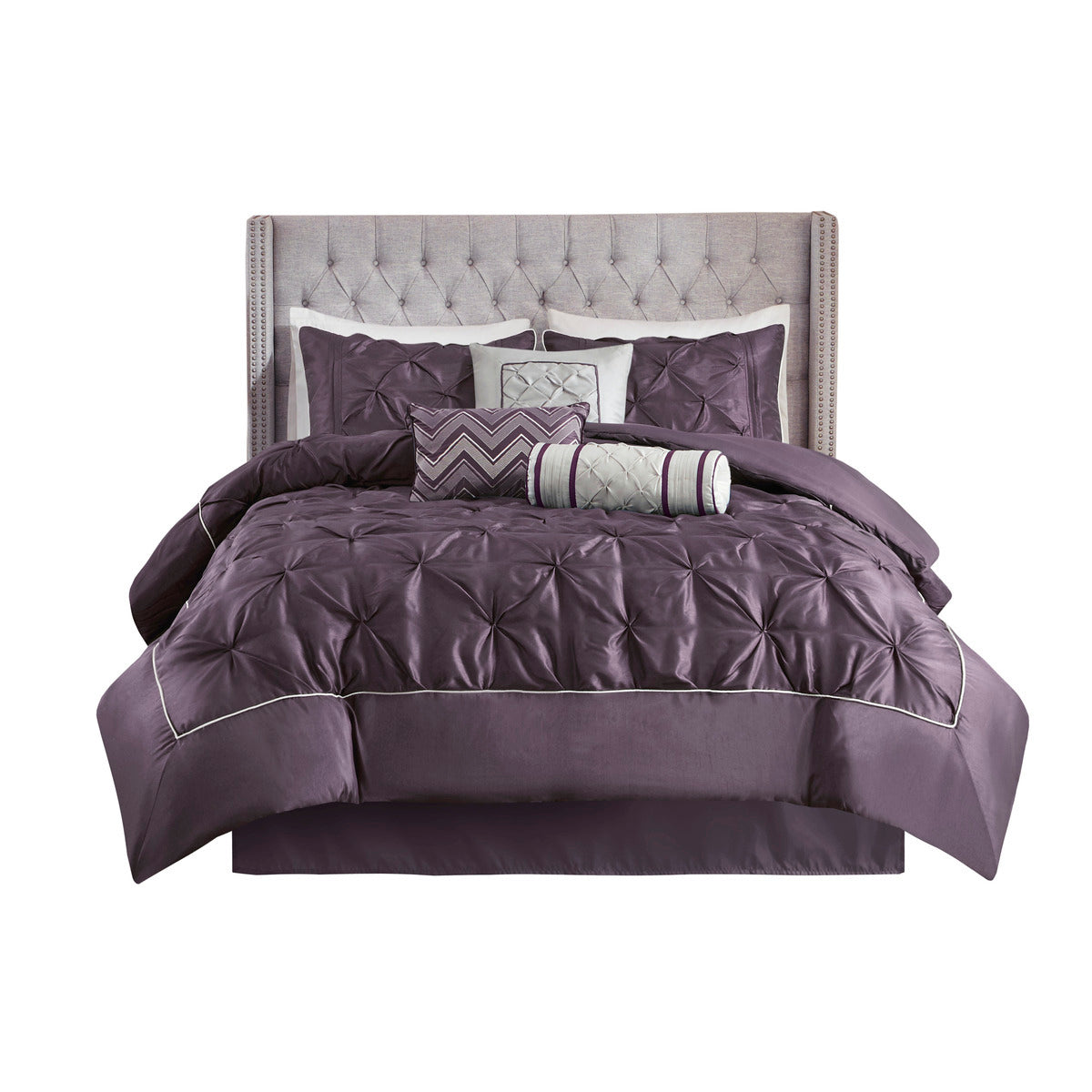7 Piece Tufted Comforter Set on a King Bed