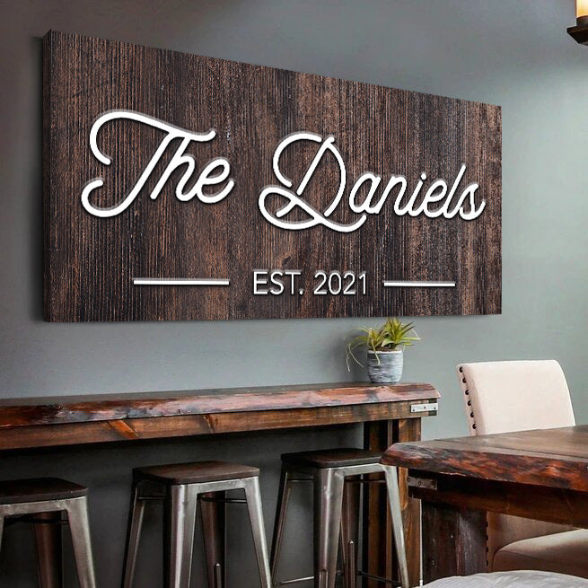 Family Name Sign IV canvas on dark woodgrain board with white script lettering EST 2021 on Tampa Home & Garden Store
