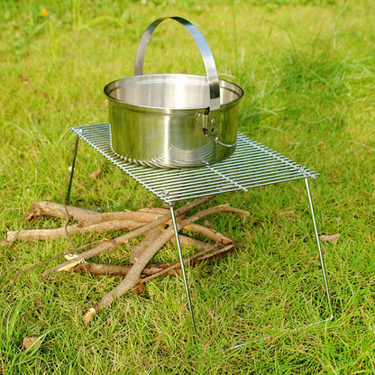 Folding campfire grill with stainless steel pot on portable wire rack outdoors on Tampa Home & Garden Store