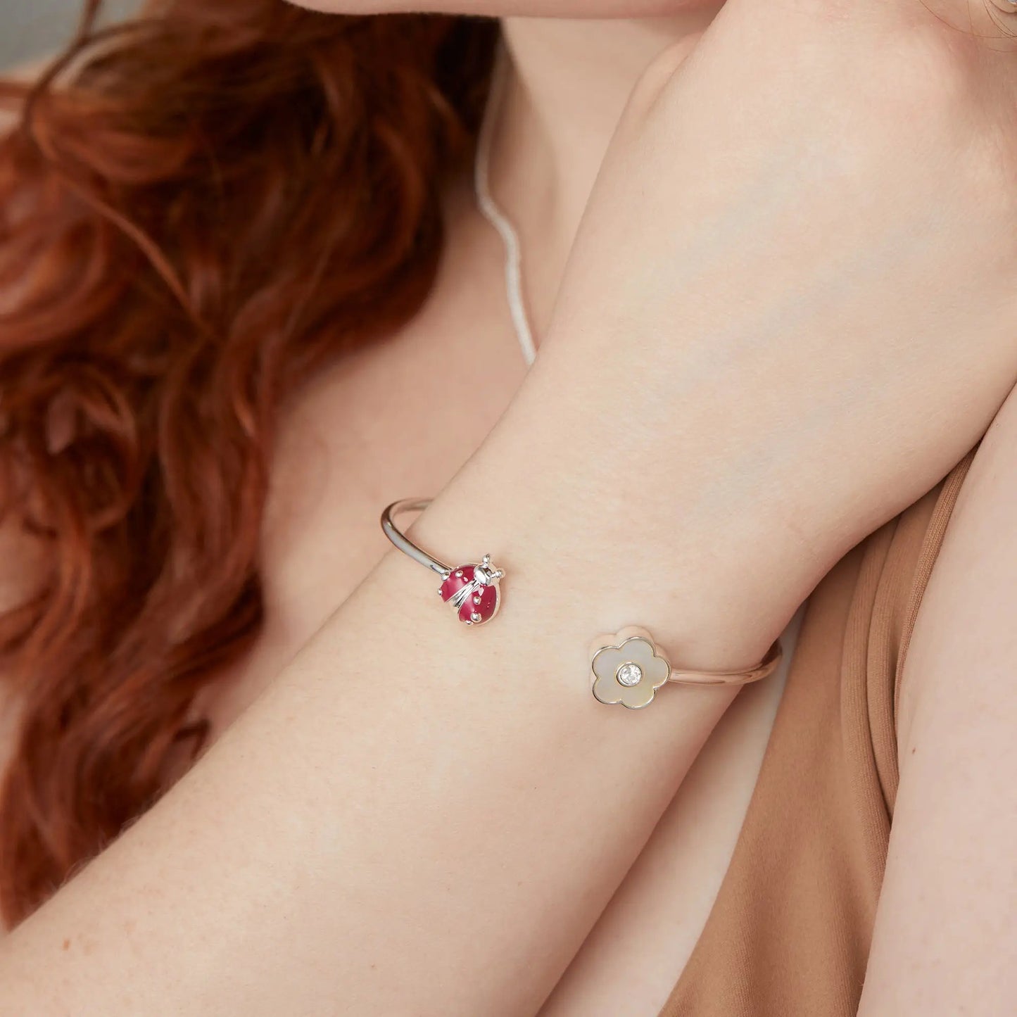 Alex and Ani Ladybug and Daisy Flex Cuff bracelet with red ladybug charm and daisy charm on a slim band on Tampa Home & Garden Store
