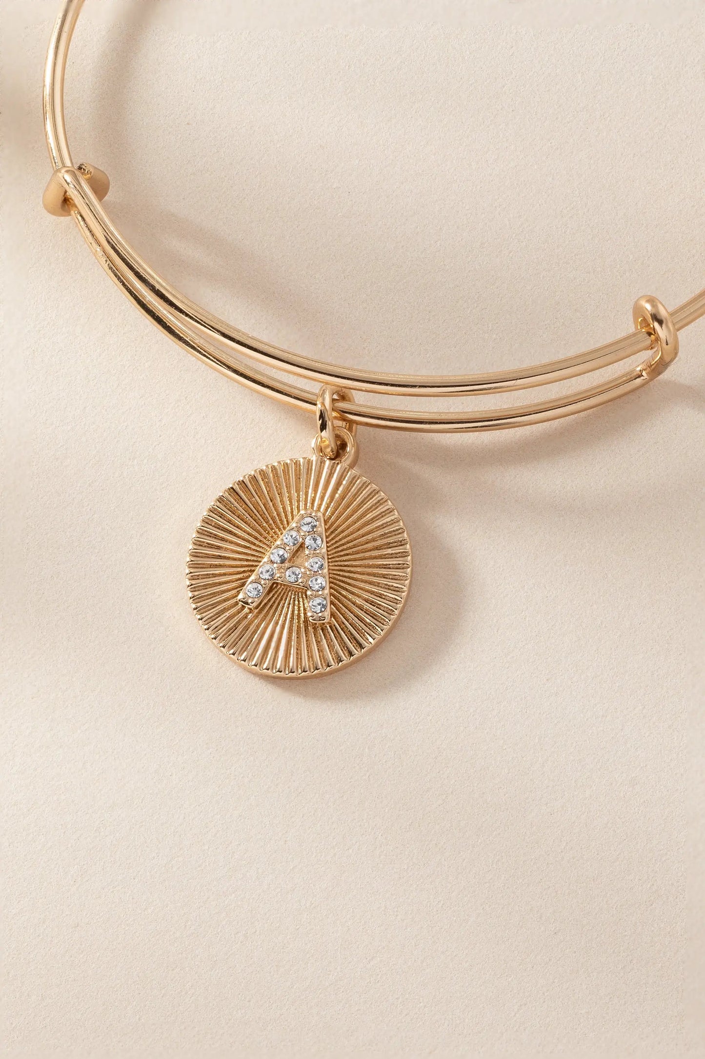 Initial A pave starburst texture bangle by Alex and Ani, gold-tone bracelet with crystal A charm on Tampa Home & Garden Store