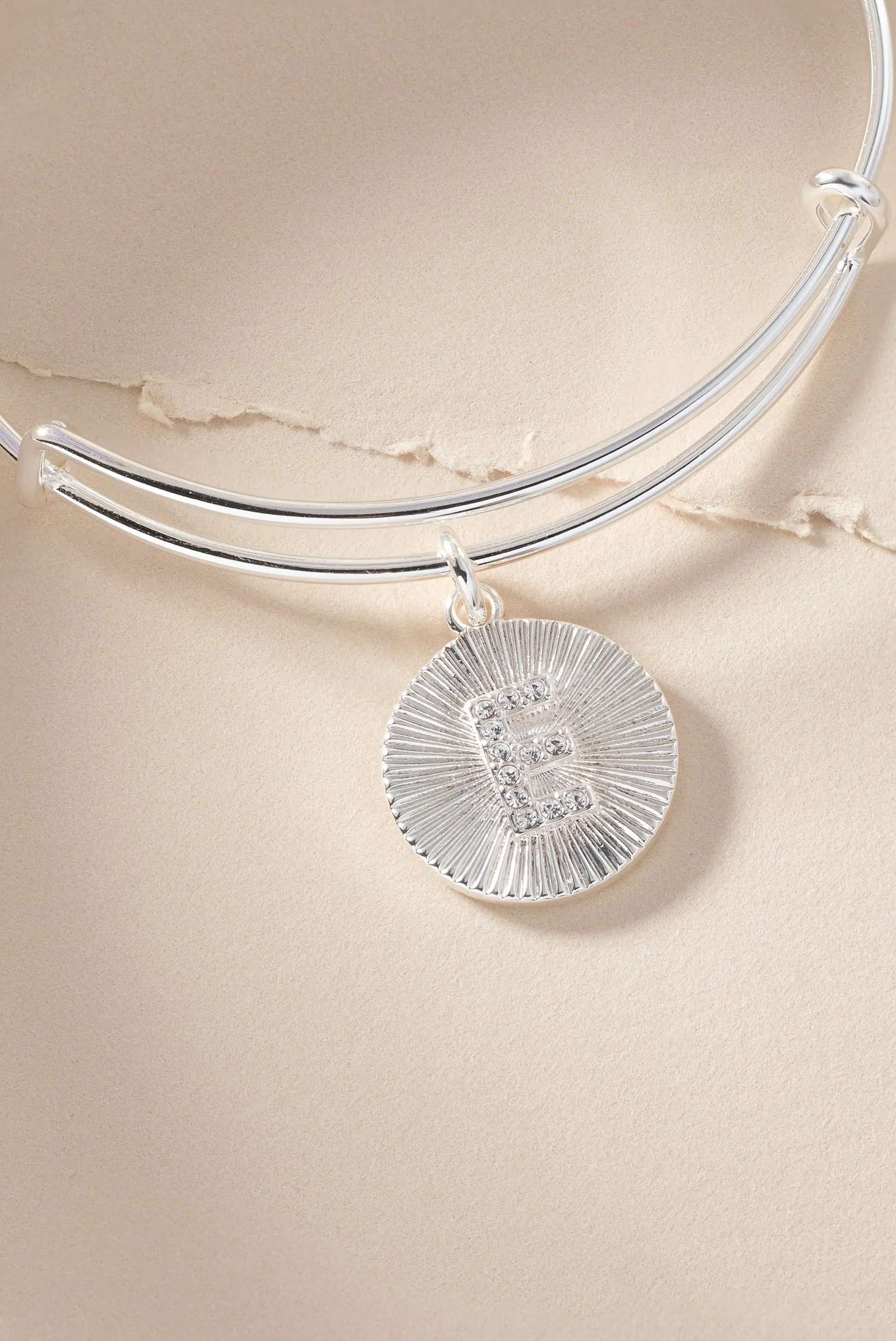 Initial E pave starburst texture bangle bracelet in silver-tone with rhinestone E charm on Tampa Home & Garden Store