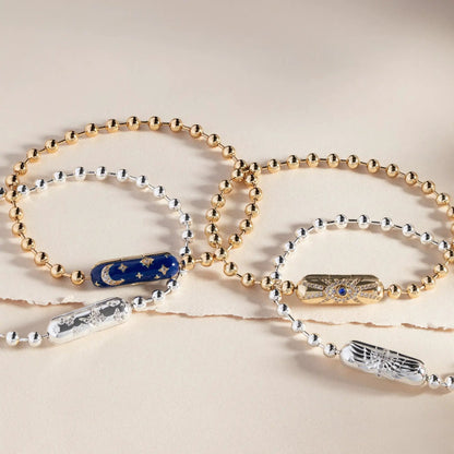 Starry Night Barrel Closure Bracelet; blue enamel star motif among bead bracelets on Tampa Home & Garden Store