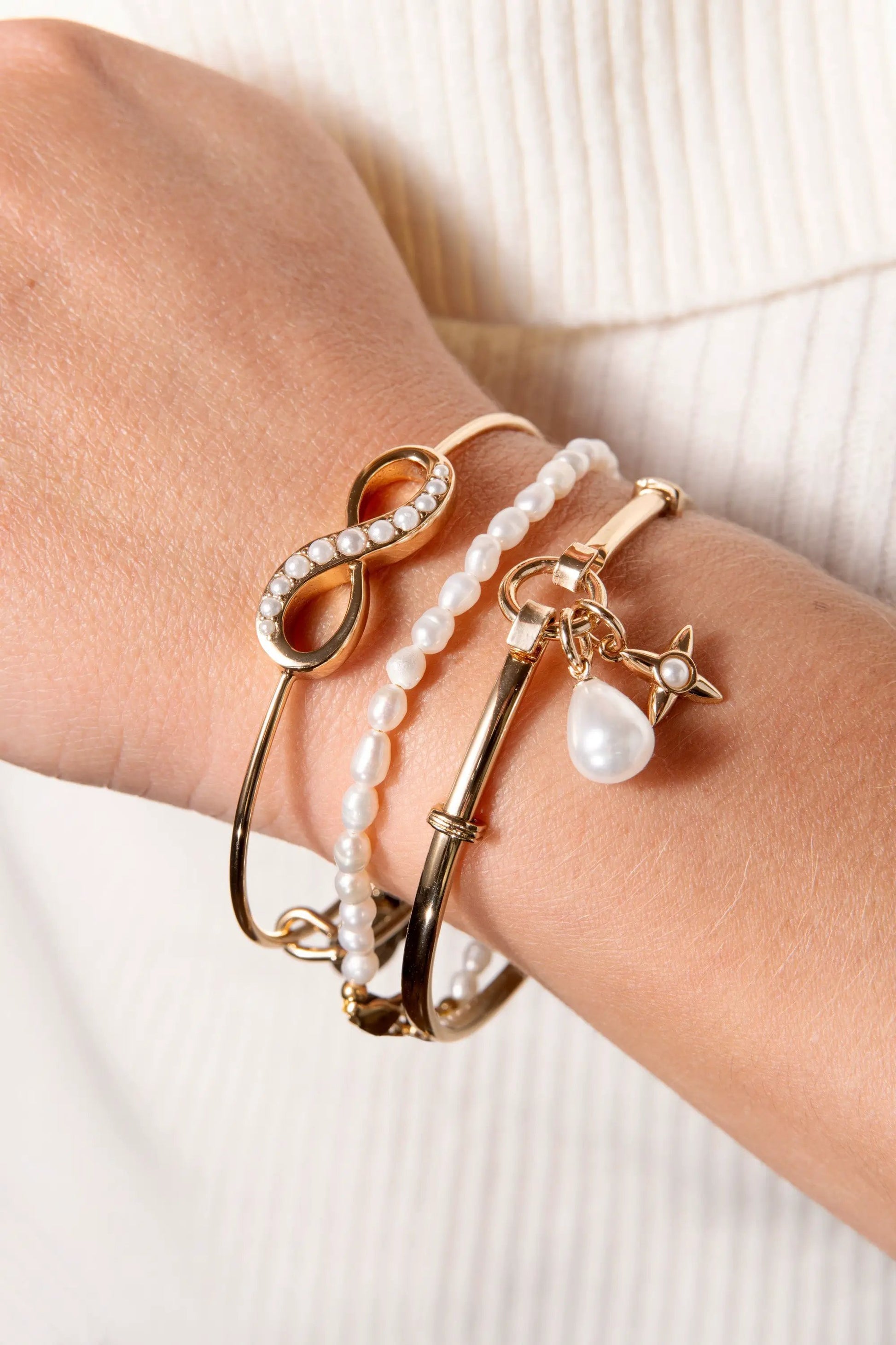 Freshwater Pearl Bracelet by ALEX AND ANI with white pearls and gold-tone accents on wrist on Tampa Home & Garden Store