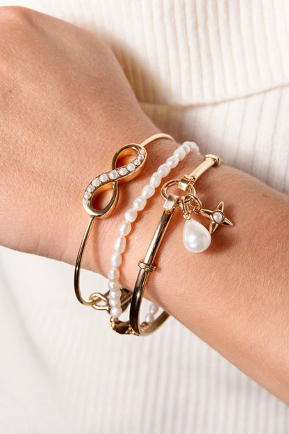 Freshwater Pearl Bracelet by ALEX AND ANI with white pearls and gold-tone accents on wrist on Tampa Home & Garden Store