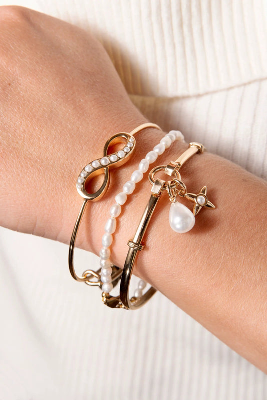 Freshwater Pearl Bracelet by ALEX AND ANI with white pearls and gold-tone accents on wrist on Tampa Home & Garden Store