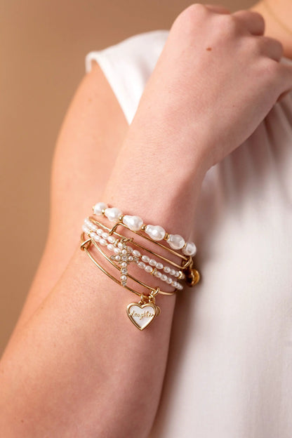 Daughter Mother of Pearl Bangle by ALEX AND ANI on wrist with gold-tone pearls and heart charm on Tampa Home & Garden Store