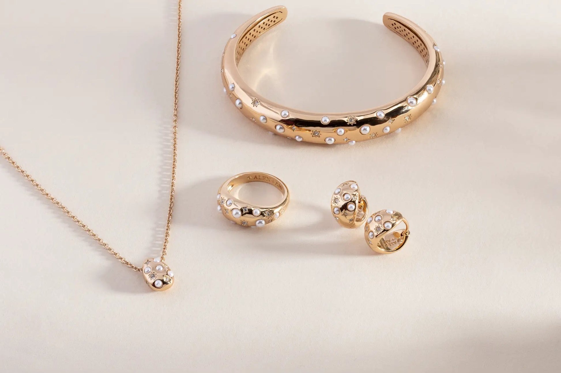 Pearl and Crystal Huggie Hoop Earrings rose gold with pearls and crystals by ALEX AND ANI on Tampa Home & Garden Store