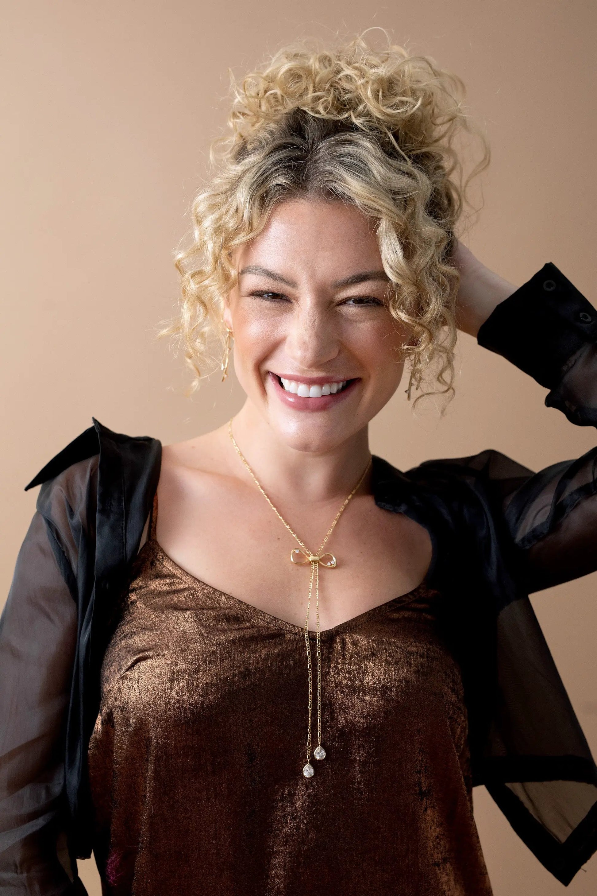 Coquette Bow Necklace by ALEX AND ANI, gold bow pendant with long chain and teardrop charms on Tampa Home & Garden Store