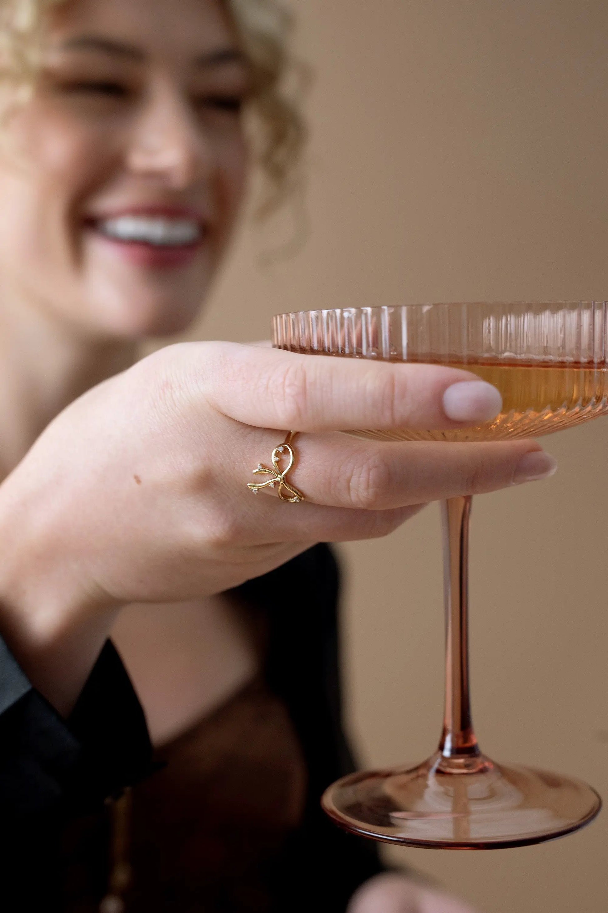 Coquette Bow Ring goldtone delicate bow design worn on finger on Tampa Home & Garden Store
