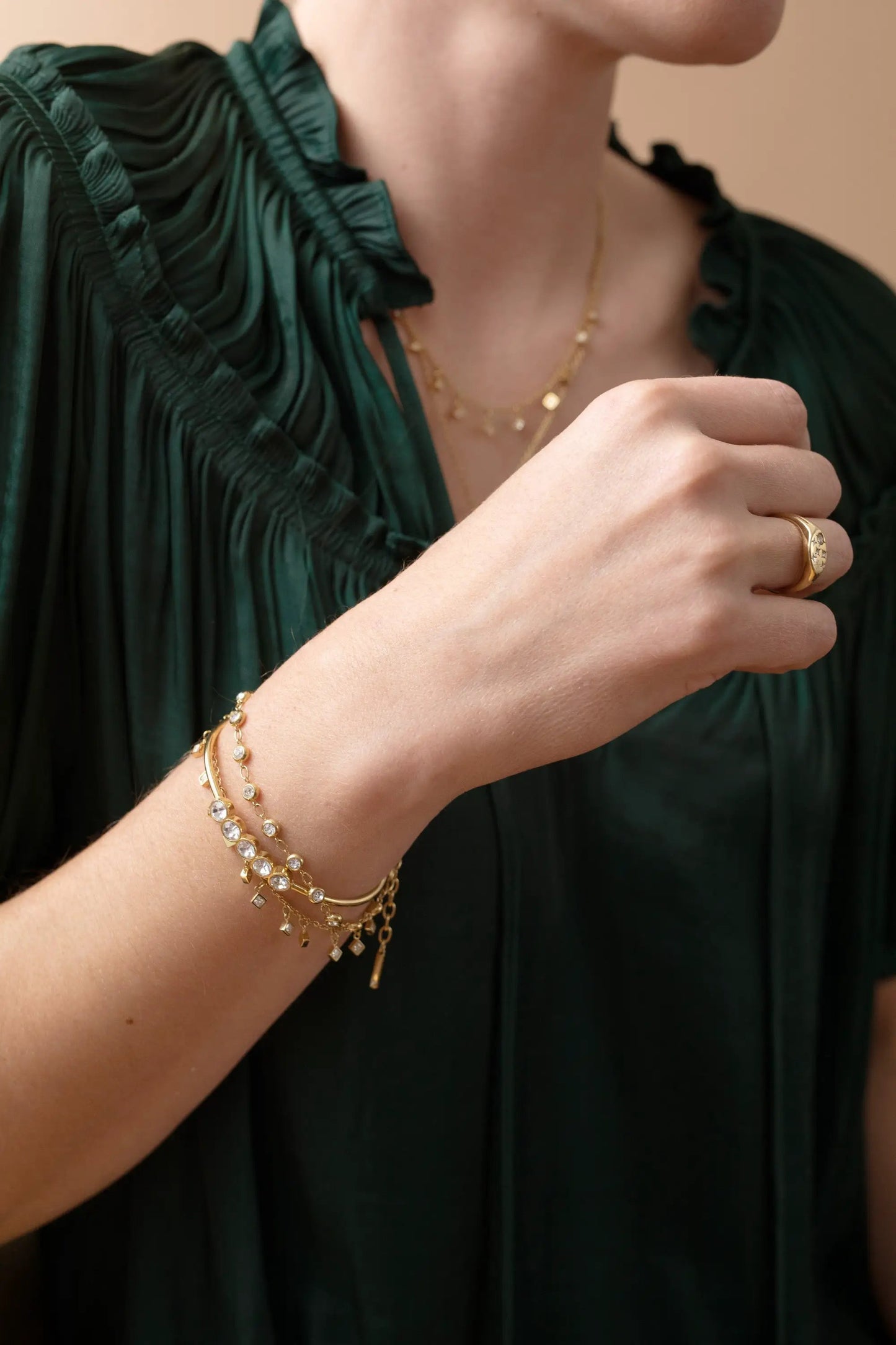 Princess Cut Crystal Bracelet, gold-tone with crystal accents, layered on the wrist on Tampa Home & Garden Store