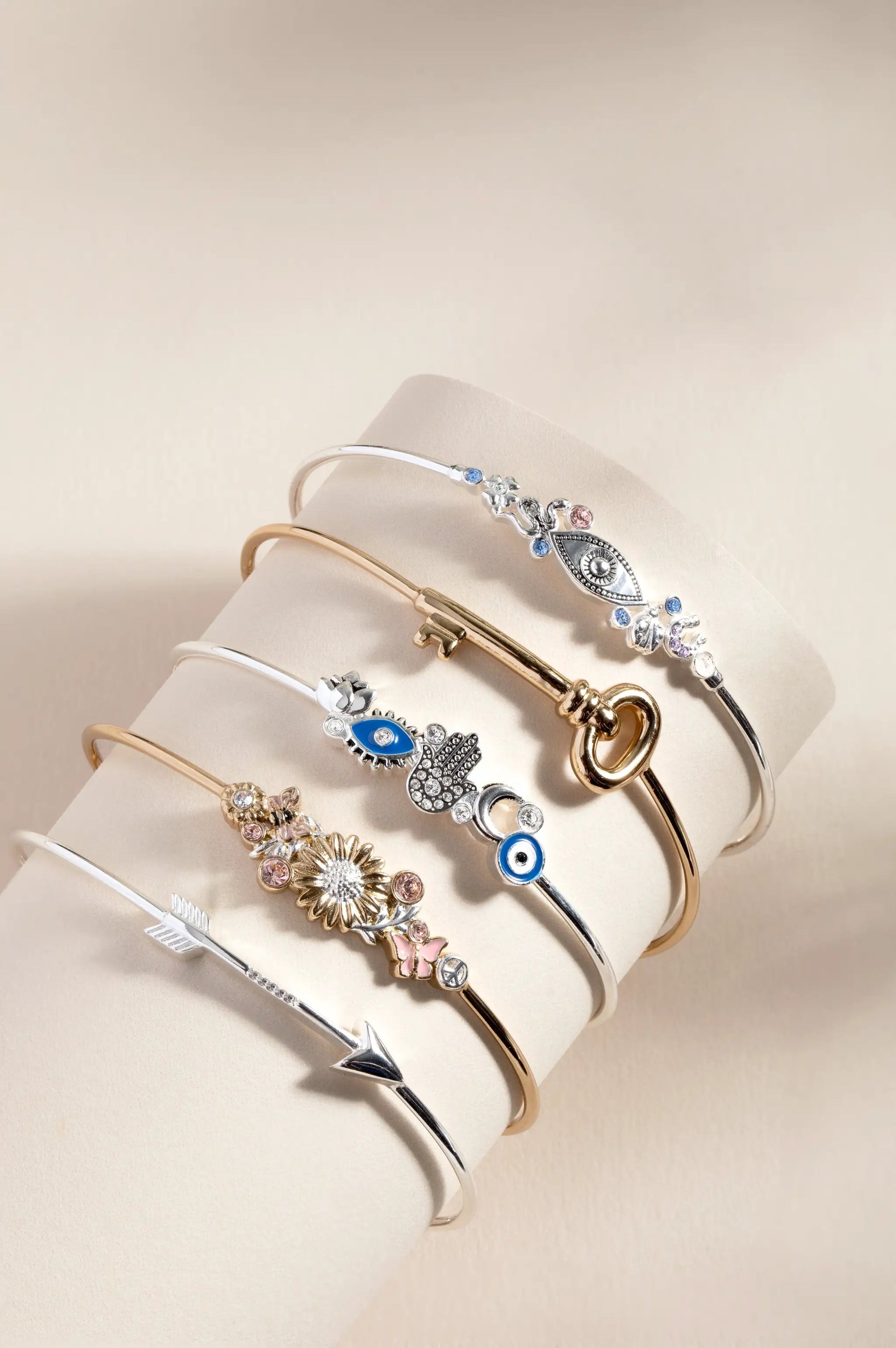 Protection Inline Bangle set of six by ALEX AND ANI, silver tone with stones on beige display on Tampa Home & Garden Store
