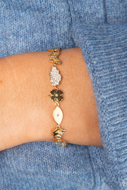 Silver Linings Chain Bracelet with gold-tone clover charms and a crystal flower charm on Tampa Home & Garden Store
