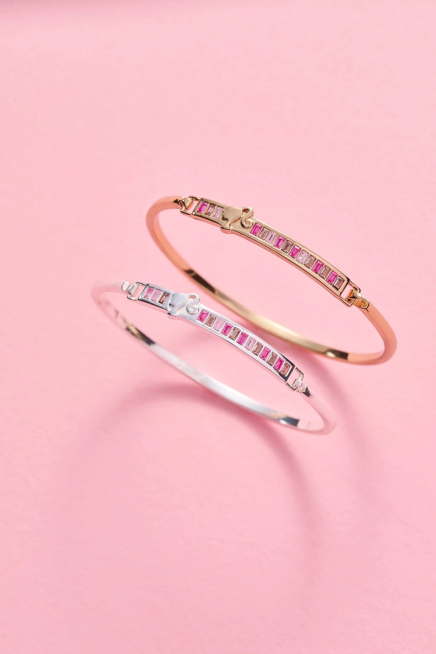 Barbie You Can Be Anything tension bangle pair in rose gold-tone & silver-tone with pink stones on Tampa Home & Garden Store