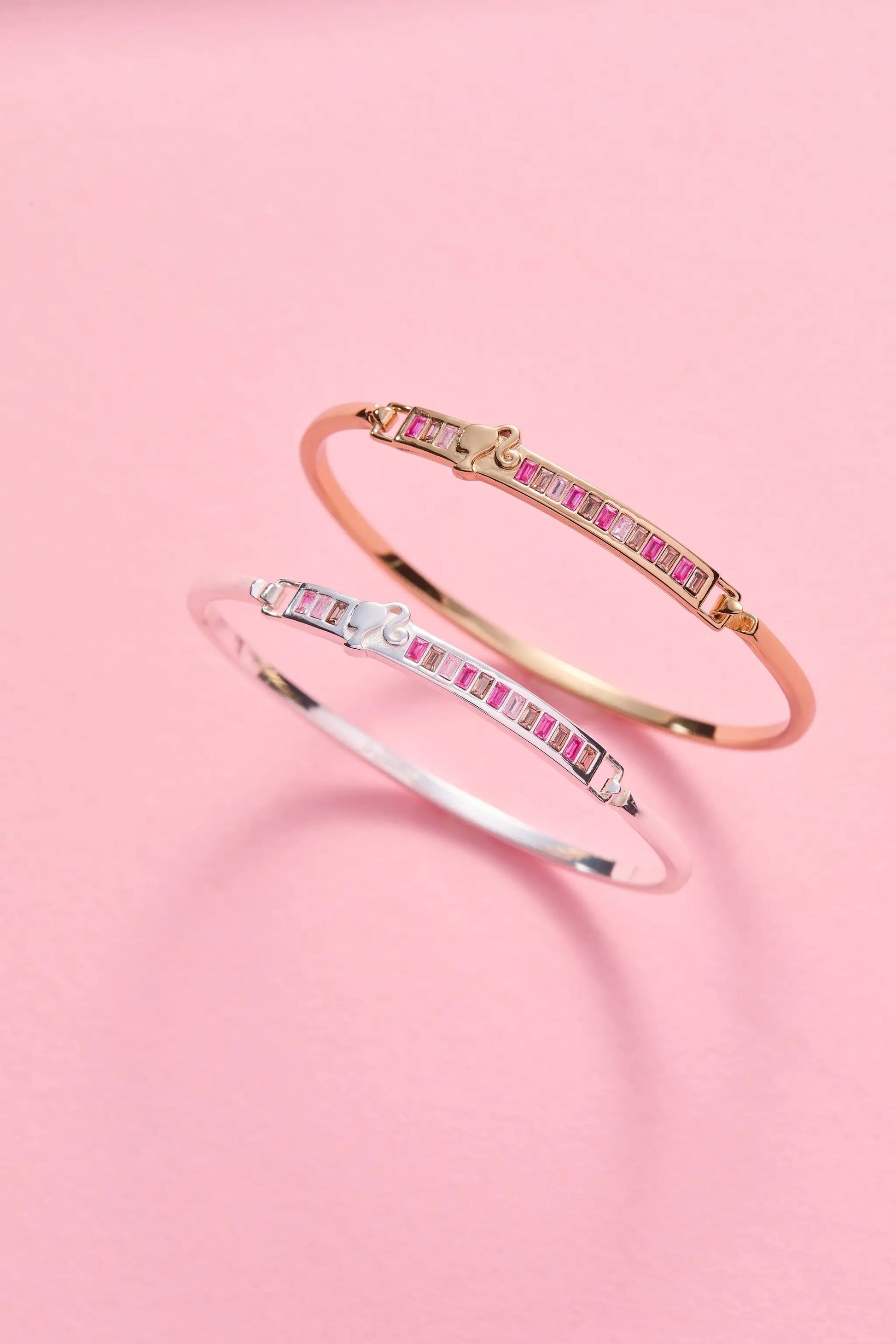 Barbie You Can Be Anything tension bangle pair in rose gold-tone & silver-tone with pink stones on Tampa Home & Garden Store