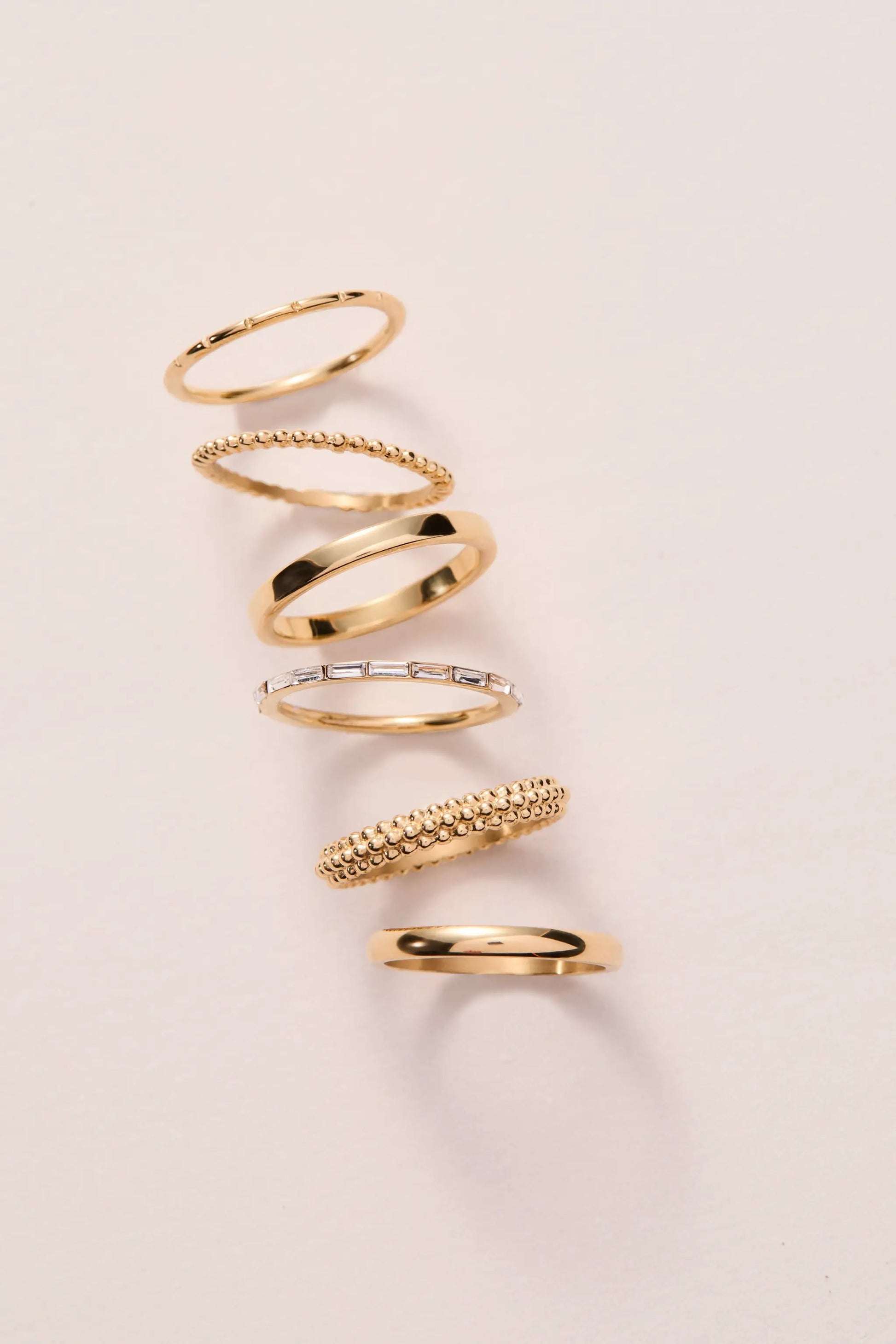 Ball Stacking Ring Set of 3 by ALEX AND ANI in gold tone with assorted textures on Tampa Home & Garden Store