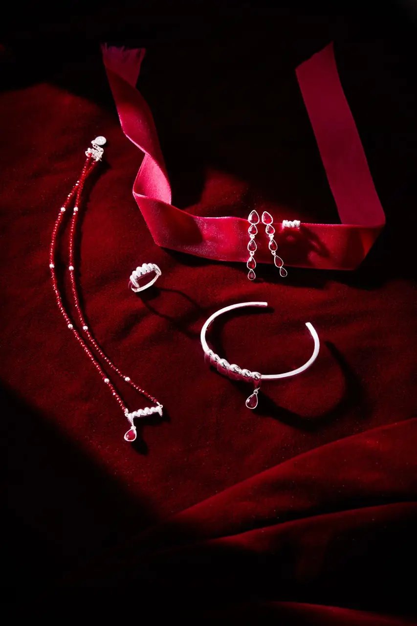 Vampire Teeth Fangs Cuff bracelet set by Alex and Ani, 3 red and silver bracelets on velvet on Tampa Home & Garden Store