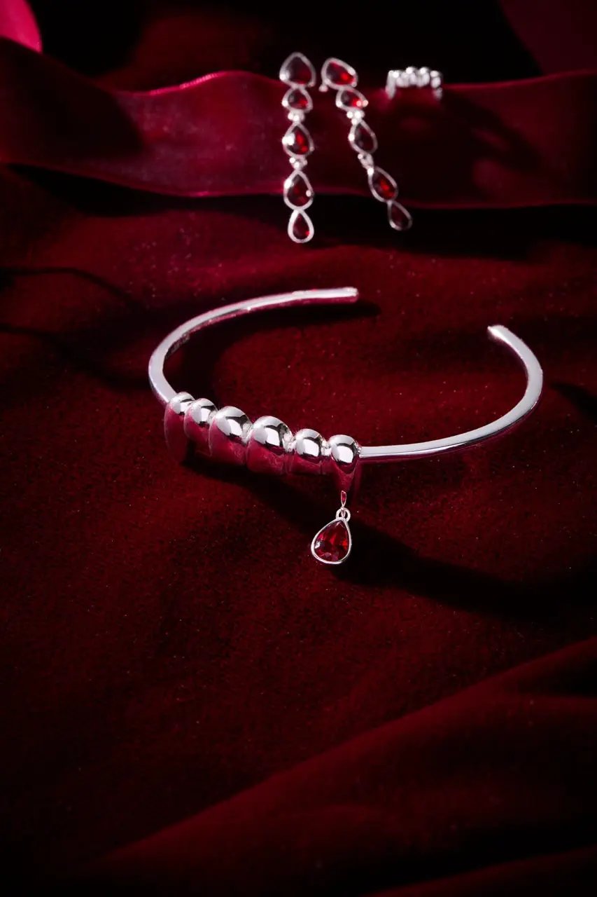 Vampire Teeth Fangs Cuff bracelet in silver with bead accents and a red teardrop charm by ALEX AND ANI on Tampa Home & Garden Store