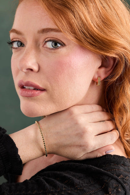 Gold Beaded Cuff Bracelet by Alex and Ani on a woman's wrist on Tampa Home & Garden Store