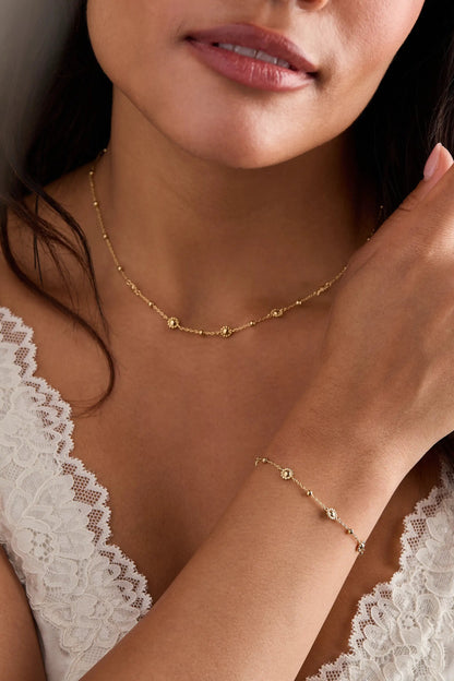Floret Chain Necklace by ALEX AND ANI in gold-tone with delicate floral stations on neck on Tampa Home & Garden Store