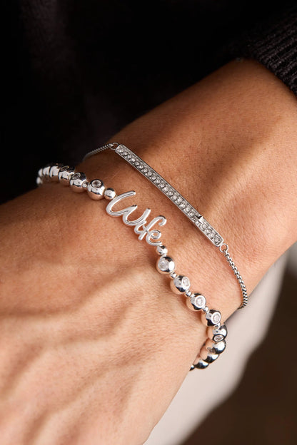 Wife Elongated Crystal Stretch Bracelet; pavé crystal bar paired with beaded bracelet on Tampa Home & Garden Store