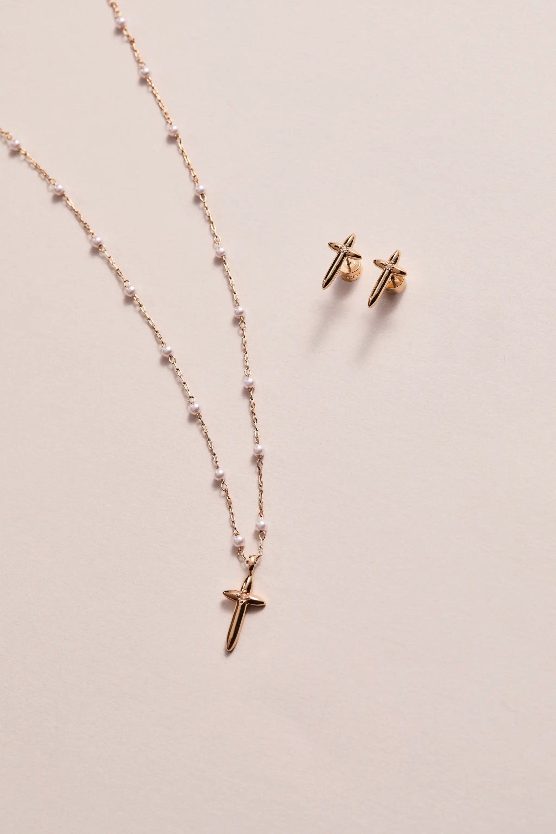 4:13 Cross Stud Earrings by ALEX AND ANI, gold-tone cross earrings with pearl necklace shown on Tampa Home & Garden Store