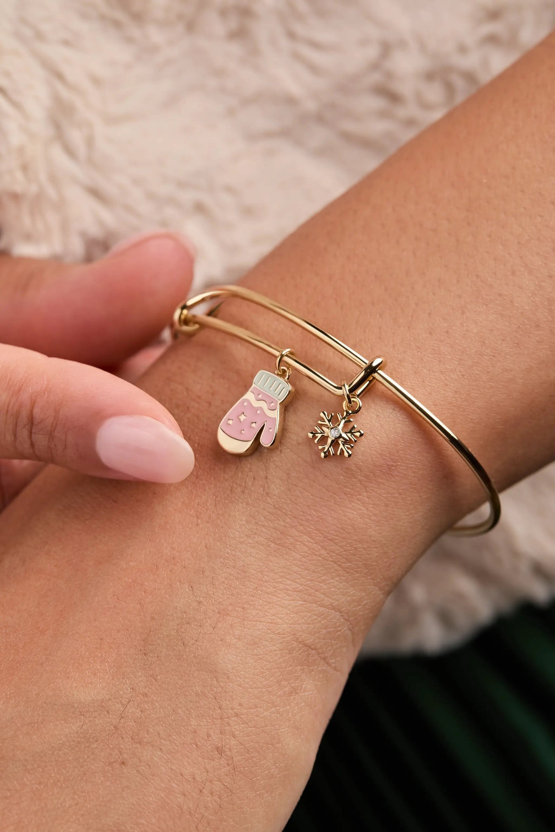 Winter Wonderland mitten and snowflake charm bangle on a gold bracelet with pink mitten on Tampa Home & Garden Store