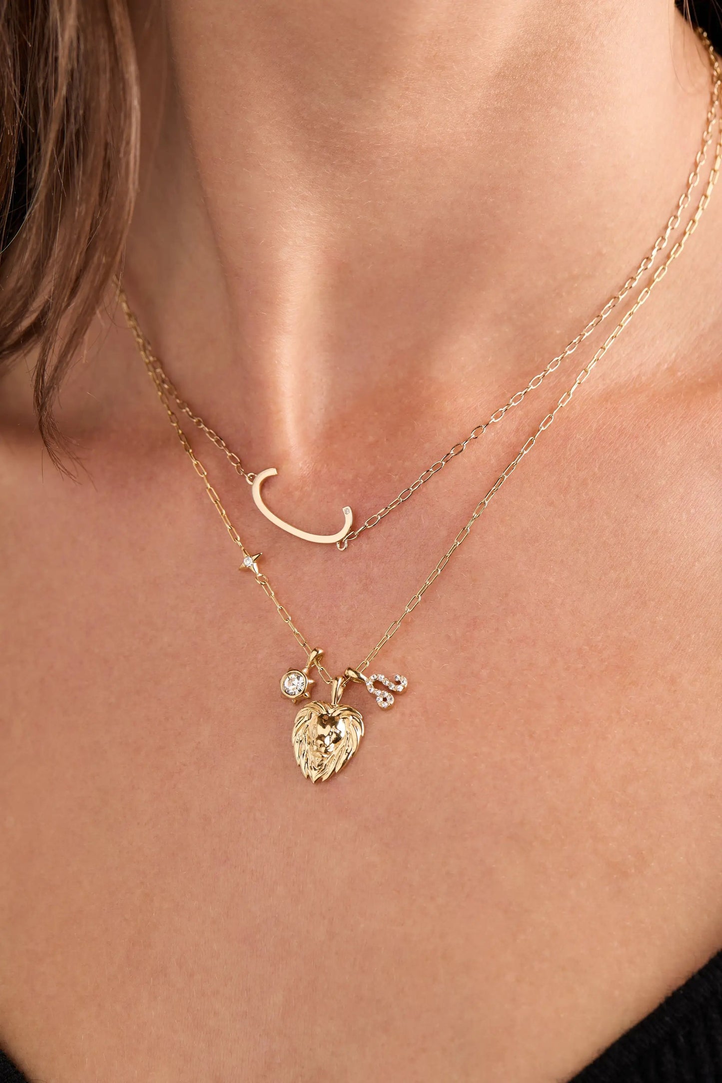 Leo Zodiac Charm Cluster Necklace gold tone with crescent pendant and star/heart charms on chains on Tampa Home & Garden Store
