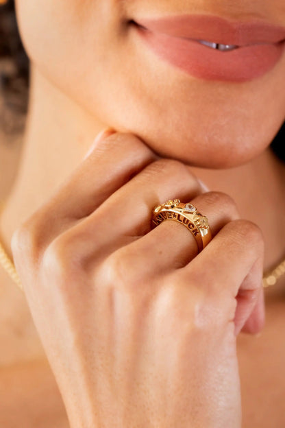 Love and Luck open domed ring by Alex and Ani in gold-tone with engraved lettering on Tampa Home & Garden Store