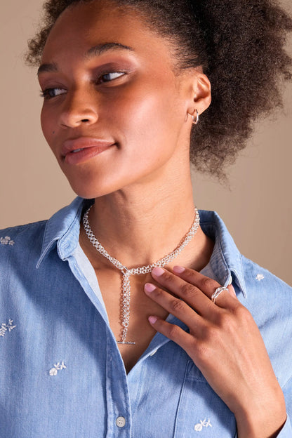 Bamboo Trio Ring Set by ALEX AND ANI; silver rings on finger with silver chain necklace on Tampa Home & Garden Store