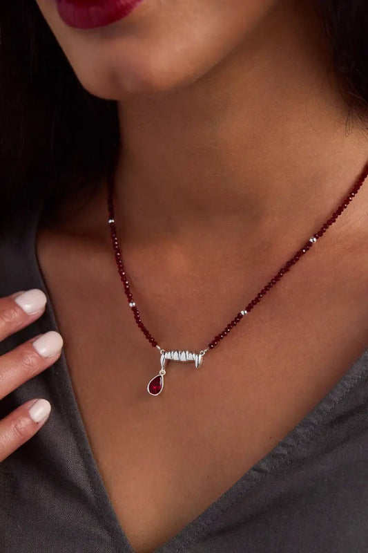 ALEX AND ANI vampire teeth pendant necklace with burgundy beads and red teardrop charm on Tampa Home & Garden Store