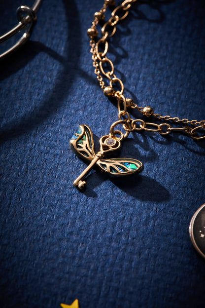 Harry Potter Flying Keys bracelet with gold-tone winged key pendant turquoise enamel on Tampa Home & Garden Store