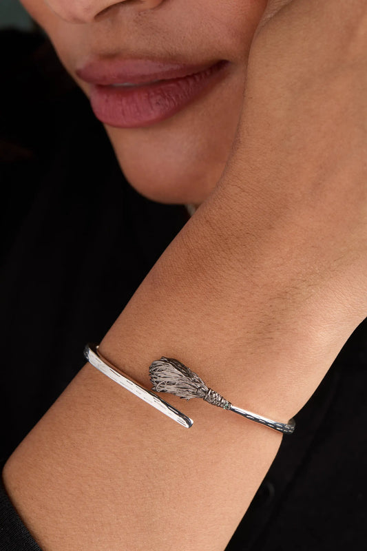 Wizard of Oz Wicked Witch Broom Bypass Cuff bracelet by ALEX AND ANI in silver with broom motif on Tampa Home & Garden Store