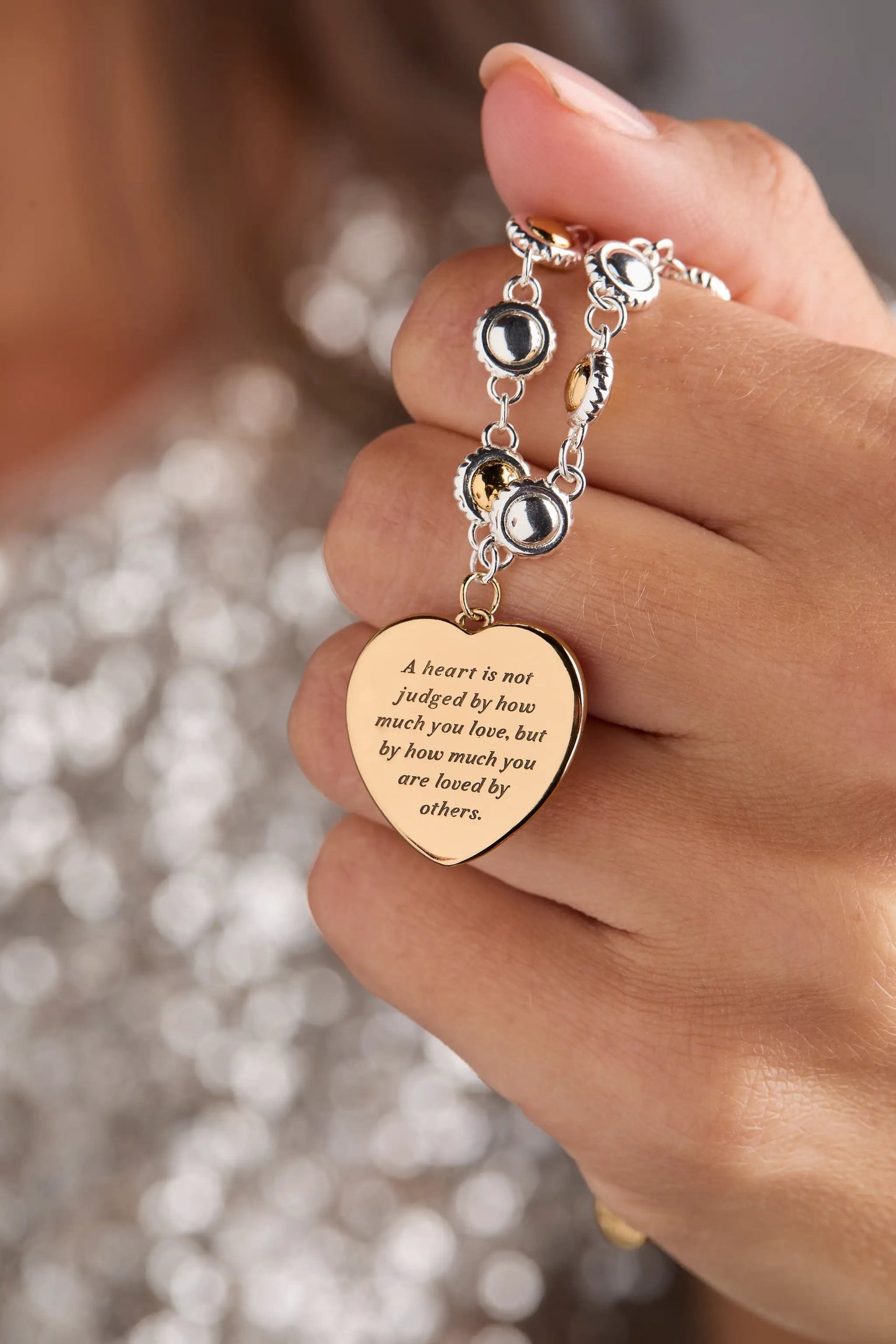 Tin Man Bracelet with silver round charms and gold-tone accents, engraved heart pendant on Tampa Home & Garden Store